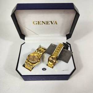 lot 61 image: WomansMens Pair Of Geneva Gold Wrist Watches New Open Box Some Wear On Bands Great Condition