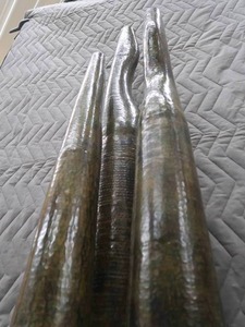 lot 12 image: SET OF 3 UNIQUE, TALL METAL VASES