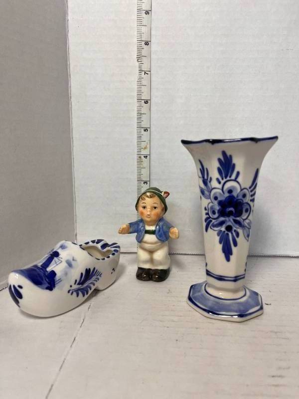 lot 94 image: Two Delft Figurines and a Single German Shaker
