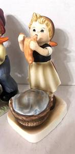 lot 57 image: Pair of Erich Stauffer Porcelain Figurines