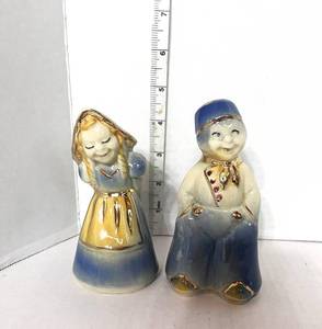 lot 64 image: Pair of Vintage Shawnee Dutch Boy and Girl Salt and Pepper