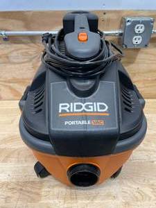 lot 29 image: RIDGID 4 Gallon 5.0 Peak HP Portable Shop Vacuum Wet Dry Vac Model # WD4070