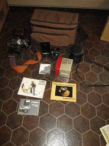 lot 236 image: Vintage Canon AE-1 35mm Camera with...