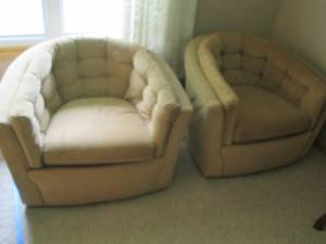 lot 9 image: Pair Soft tan Vintage swiveling lou...