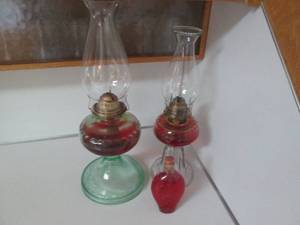 lot 60 image: 2 Oil lamps and a bottle of lamp oi...