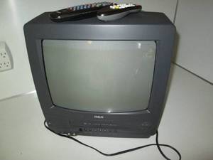 lot 61 image: RCA TV with built in VCR player...