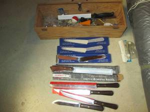 lot 85 image: Wood box filled with new knives and...