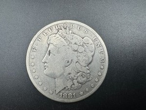 lot 12 image: 1881 Mid Grade Morgan Dollar