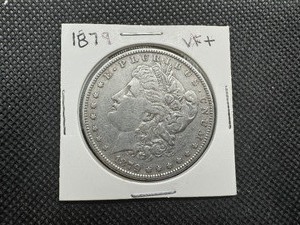 lot 34 image: 1879 Mid Grade Morgan Dollar VF or Better