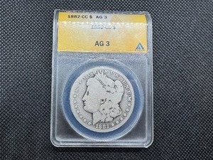 lot 65 image: 1882 CC AG3 Morgan Dollar. Another Affordable Slot Filler