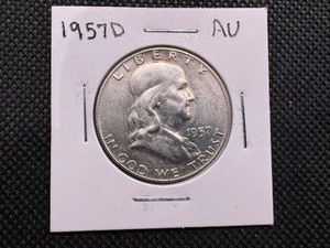 lot 75 image: 1957 D High Grade Franklin Half AU or Better
