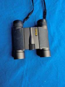 lot 60 image: Nikon 10x25 4.5 L Binocular