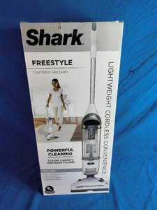 lot 95 image: Shark Navigator Freestyle Cordless Upright Vacuum