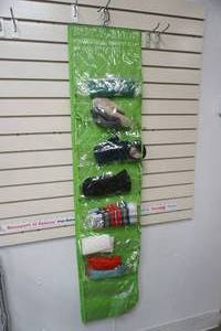 lot 159 image: Vintage Shoe Organizer with Womens Gloves, Scarfs, ponchos and more