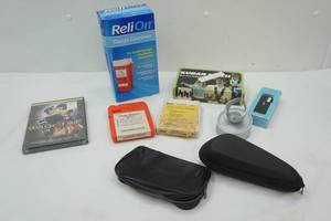 lot 179 image: ReliOn Sharps Container, 8-track cleaner, camera strap, Walk The Line DVD