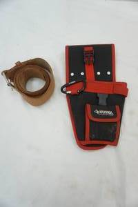 lot 254 image: leather tool belt 54long and Husky Tool holder