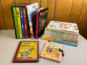 lot 27 image: The Wonderful World of Walt Disney Books & Charlie Brown Dictionary Set
