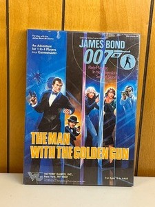 lot 36 image: James Bond 007 Role Playing in Her Majestys Secret Service Game - The Man with the Golden Gun - Sealed