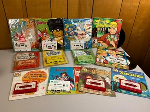 lot 25 image: Children Read Along Book and Tape & Records