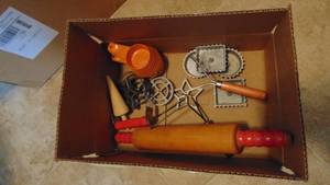 lot 17 image: Vintage Rolling Pin, Tupperware Measuring Cups and Rosette Iron