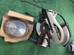 lot 28 image: Pro-Tech Table Saw with over 10 blades