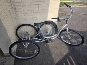 lot 55 image: Used Tricycle along with 2 New Spare Tiers
