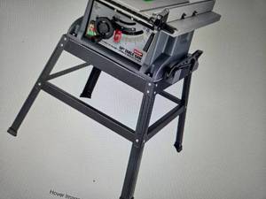 lot 58 image: 10 in. 15 Amp Table Saw with Metal Stand, Miter Gauge, Push Stick and Rip Fence (USED)