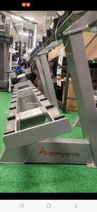 lot 23 image: Heavy-duty 2 Tier Freemotion Dumbbell Rack (Used). Sold online for over $3000 New