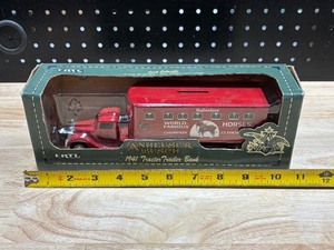 lot 26 image: ERTL Anheuser Busch Tractor Trailer Coin Bank