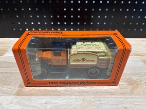 lot 44 image: ERTL 1931 Hawkeye Delivery Fleet Farm Model