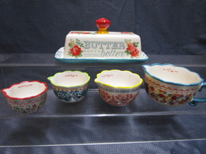 lot 30 image: P. Woman Measuring Cups, Butter