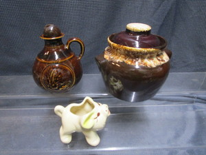 lot 178 image: Bean Crock, Oil Lamp, Piggy Planter