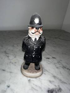 lot 43 image: Signed Ceramic Bulldog Figurine in Police Uniform