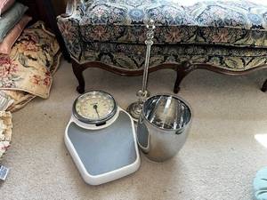 lot 54 image: Vintage Household Items Set Bathroom Scale, Ice Bucket, and Candlestick