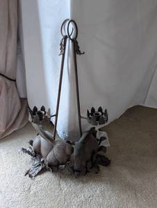 lot 195 image: Pair of Rustic Iron Rabbit Candle Holders with Leaf Detail
