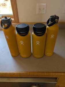 lot 405 image: Set of 4 Yellow Hydro Flask Water Bottles with Personalization