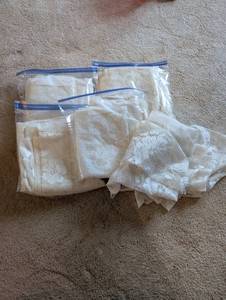 lot 428 image: Collection of Sheer Ivory Lace Fabric Pieces
