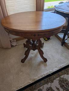 lot 16 image: Antique Round Wooden Pedestal Table