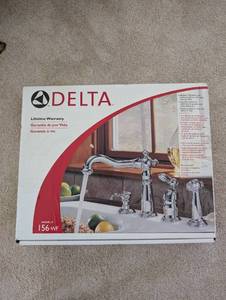 lot 454 image: Delta Model 156-WF Chrome Kitchen Faucet Set with Accessories NEW