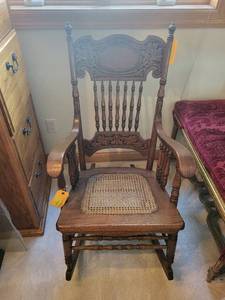 lot 363 image: Antique Oak Wood Rocking Chair with Carved Detailing and Cane Seat
