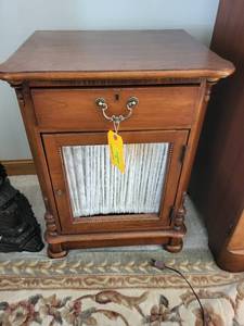lot 379 image: Antique Wooden Side Cabinet with Brass Handles and Textured Fabric Front