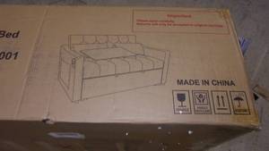 lot 4 image: grey velvet sofa bed...