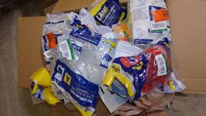 lot 28 image: big box full of tile wedges and cli...