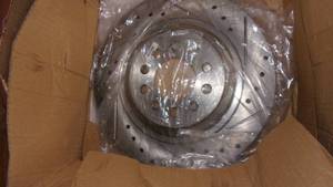 lot 31 image: front and rear break rotors and pad...