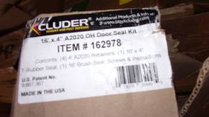 lot 39 image: 16 foot x 4 inch overhead door seal...