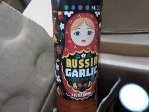 lot 124 image: Case of 36 ct Russia Garlic 3 oz Sa...