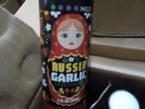 lot 125 image: Case of 36 ct Russia Garlic 3 oz Sa...