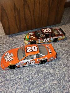 lot 42 image: Set of 2 Tony Stewart #20 Home Depot NASCAR Diecast Cars