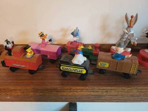 lot 84 image: Collection of Looney Tunes Character Figures and Train Set