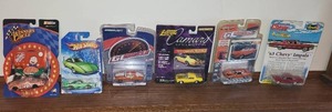lot 88 image: Collection of 7 Diecast Model Cars in Original Packaging